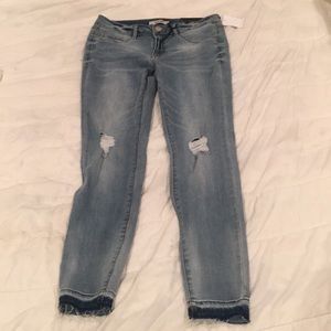 Skinny denim blue jeans. Never worn. Size 6.